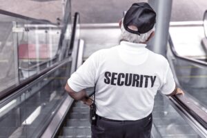 security, man, escalator